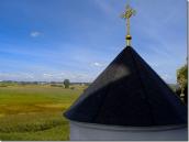 2009 р. Дах башти на тлі пейзажу