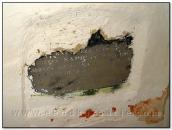 Надгробна плита в процесі розкриття…