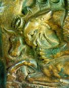 Голови грифона та оленя