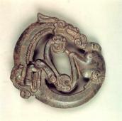 Пластина вуздечки у формі згорнутого…