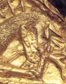 Голови грифона та оленя