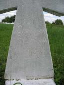 Напис на стовпі хреста