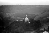 1990 р. Церква в панорамі села. Вигляд…