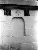 Фрагмент фасаду дзвіниці з рельєфами