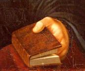 Ліва рука з книгою