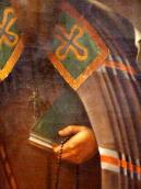 Ліва рука з книгою і чотками