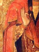 Ліва рука Марії з квіткою