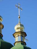 Ліхтарик і хрест верху вівтаря