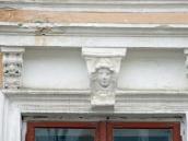 Маскарон дівчини