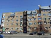 2021 р. Ліва частина фасаду по вул.…